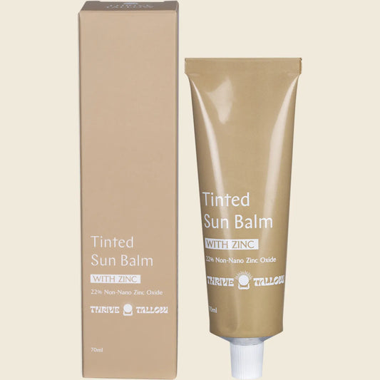 Thrive Tallow Tinted Sun Balm with Zinc 70ml tub and box featuring a natural, grass-fed tallow formula.