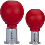 Two clear silicone facial sculpting cups in two different sizes on a white background.