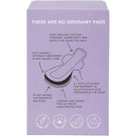 Left side of a TOM Organic Ultra Thin Overnight 8 Pack box showing product features and 100% organic cotton logo.