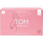 8-pack of TOM Organic wingless maternity pads in a white box with purple and teal leaf designs.