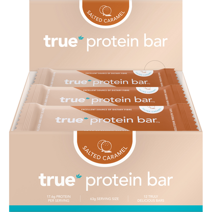 Box of 12 True Protein Salted Caramel bars in a beige display box with one individually wrapped bar in front.