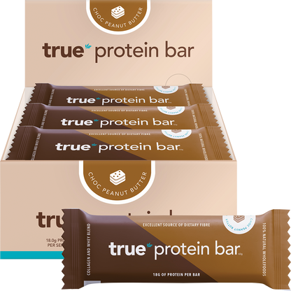 True Protein Choc Peanut Butter 12-pack display box, individual 63g bar, and loose peanuts on a white background.