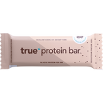 True Protein cookies and cream protein bar in blue and white packaging with a 63g serving size.