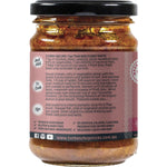 Side view of a Turban Chopsticks Thai Red Curry Paste jar showing ingredients and nutritional information.