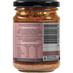 Side view of a Turban Chopsticks Thai Red Curry Paste jar showing product features and a gluten-free logo.