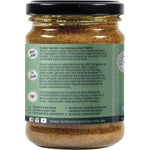 Side view of a Turban Chopsticks Korma Curry Paste jar with a yellow label and botanical illustrations.
