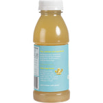 Close-up of The Ginger People Gingerade Honey & Lemon 360ml glass bottle with a yellow label and a silver screw cap.