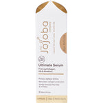 Close-up of The Jojoba Company Ultimate Serum bottle with a gold pump, showing clinical results on the label.