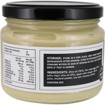 A jar of olive egg spread with a black lid, showing the back of the label with nutritional information and ingredients. The product is photographed on a clean white background.