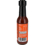 Back view of a bottle of Jinyi Shady Pepper Sauce, showing the orange nutrition label and barcode against a white background.
