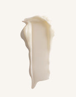 Close-up of a person applying white Epzen body butter onto their arm from a purple 150ml tub.