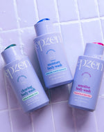 A person with clear skin smiling, representing the dolphin-smooth results of the Epzen Clearing Body Wash.