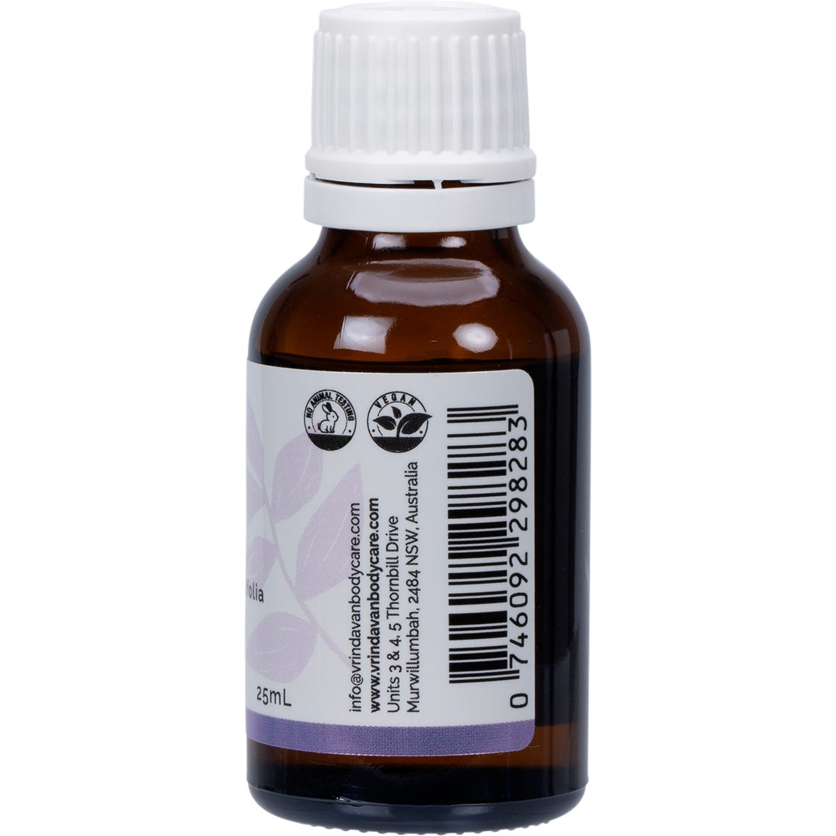 Right side of a Vrindavan 25ml Lavender Essential Oil bottle showing the barcode and purple floral label.