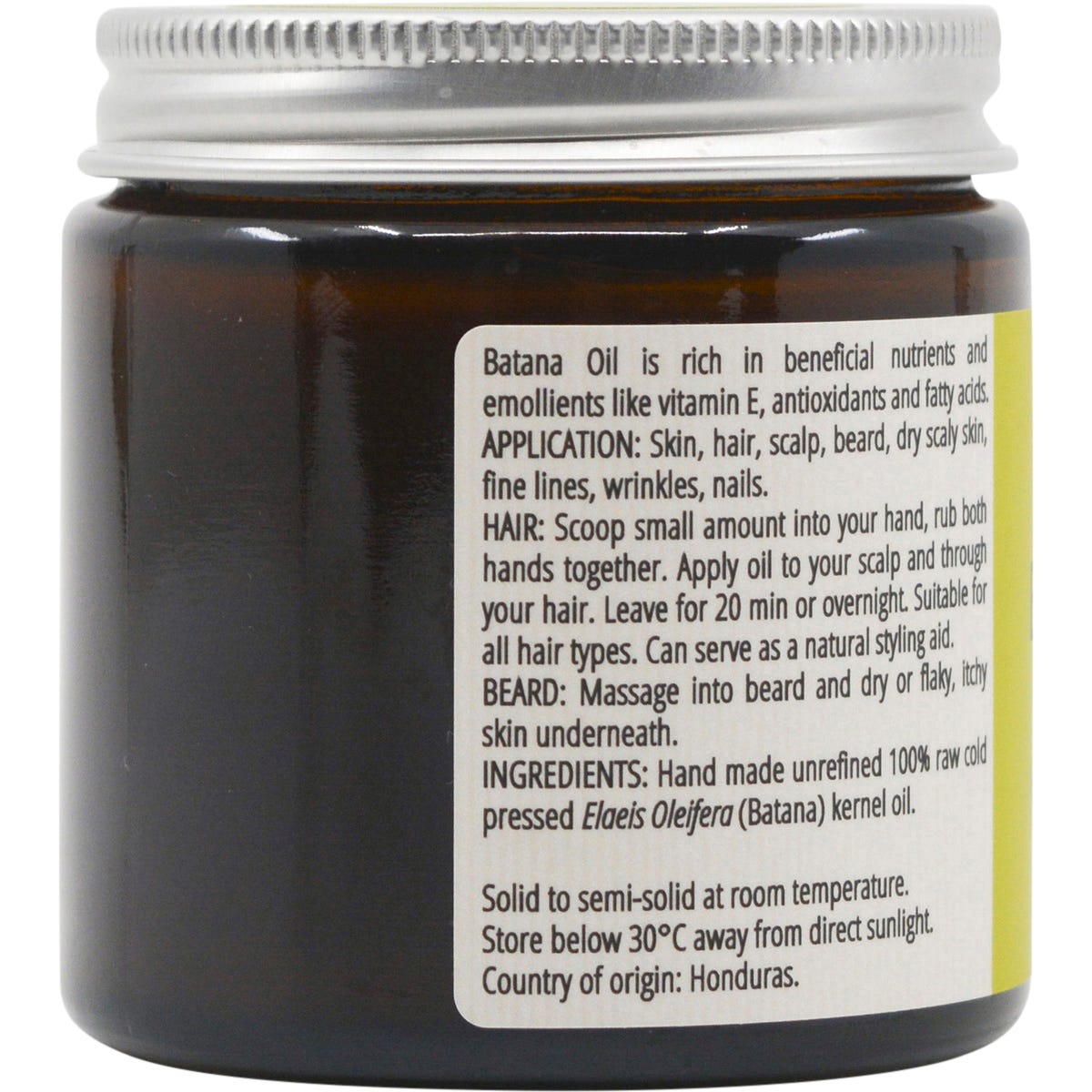 Left side of a 100ml glass jar of Vrindavan Raw Batana Oil showing usage instructions for hair and skin.