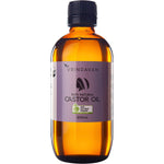 200ml amber glass bottle of Vrindavan 100% Natural Castor Oil with a black screw cap and a detailed botanical label.