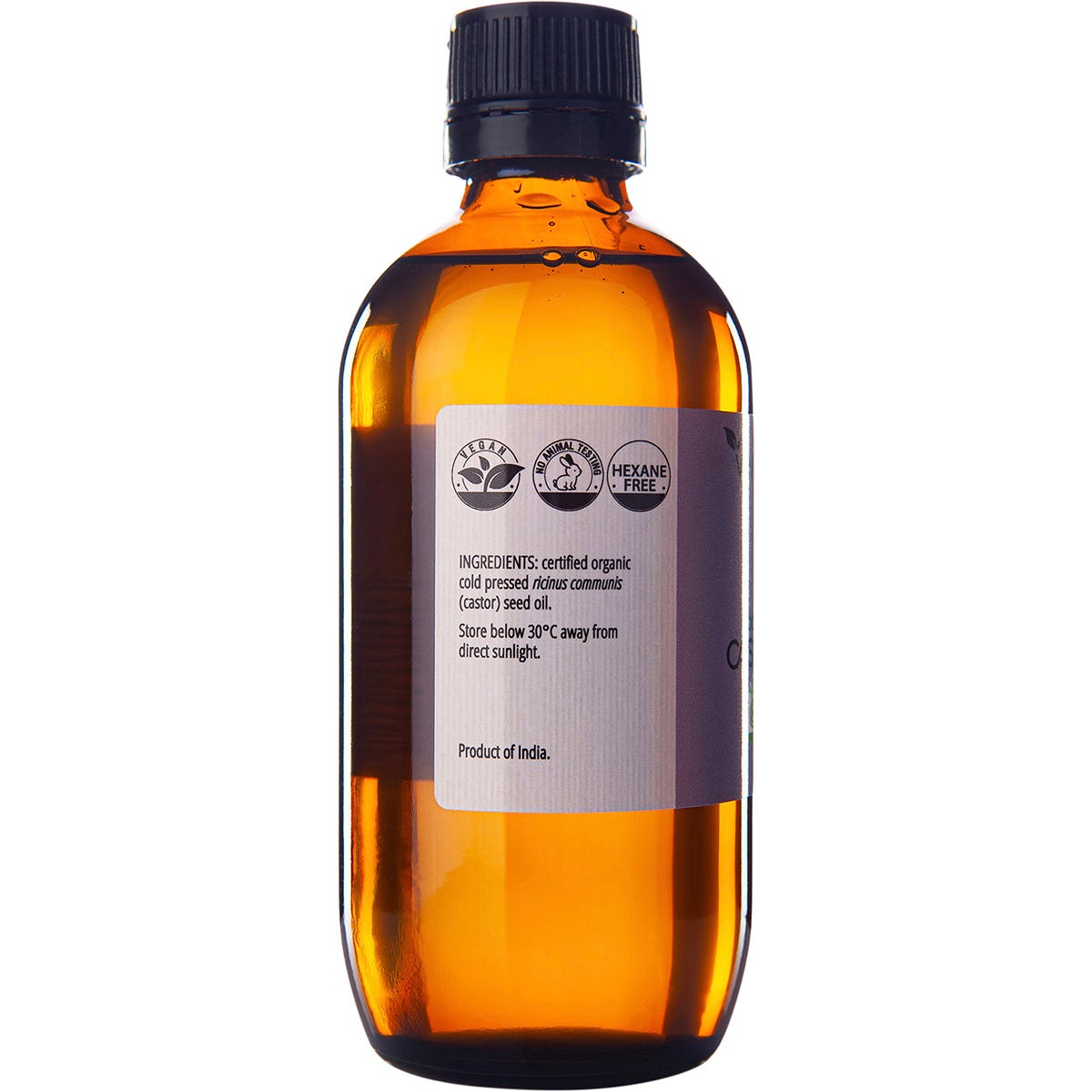 Left side of the 200ml Vrindavan Castor Oil bottle showing usage instructions and details on the botanical label.