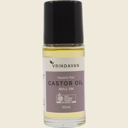 50ml Vrindavan Castor Oil roll-on glass bottle with a white cap and brown label on a white background.