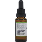 Side view of a 25ml bottle of Vrindavan Moringa Oil with a gold and green label on a white background.