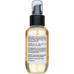 Right side of a Vrindavan 100ml Argan Oil bottle showing organic certification and product benefits.