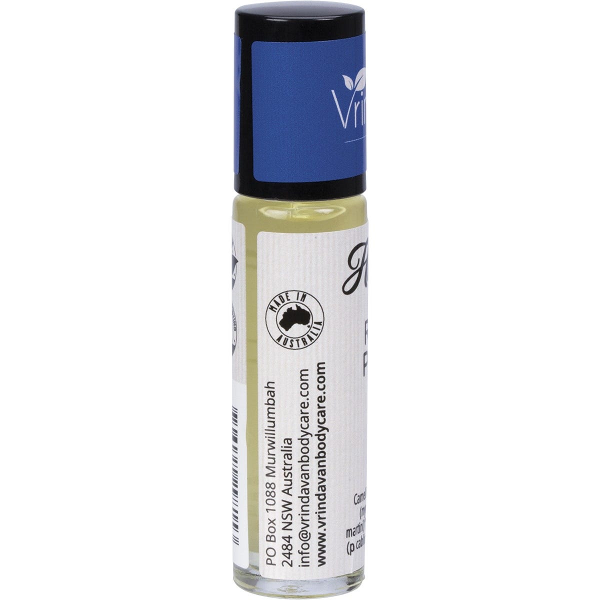 Side view of a 10ml amber glass roll-on bottle of Vrindavan Himalayan Sunset organic perfume oil with a white label.