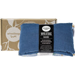 Blue French flax linen wheatbag, lavender scented, shown both folded inside its gift box and laid flat.