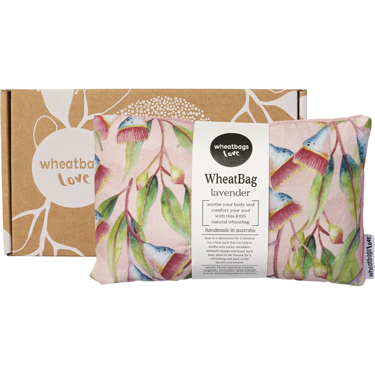 Wheatbag with a native Australian gum blossom floral print on a white background, next to its matching gift box.