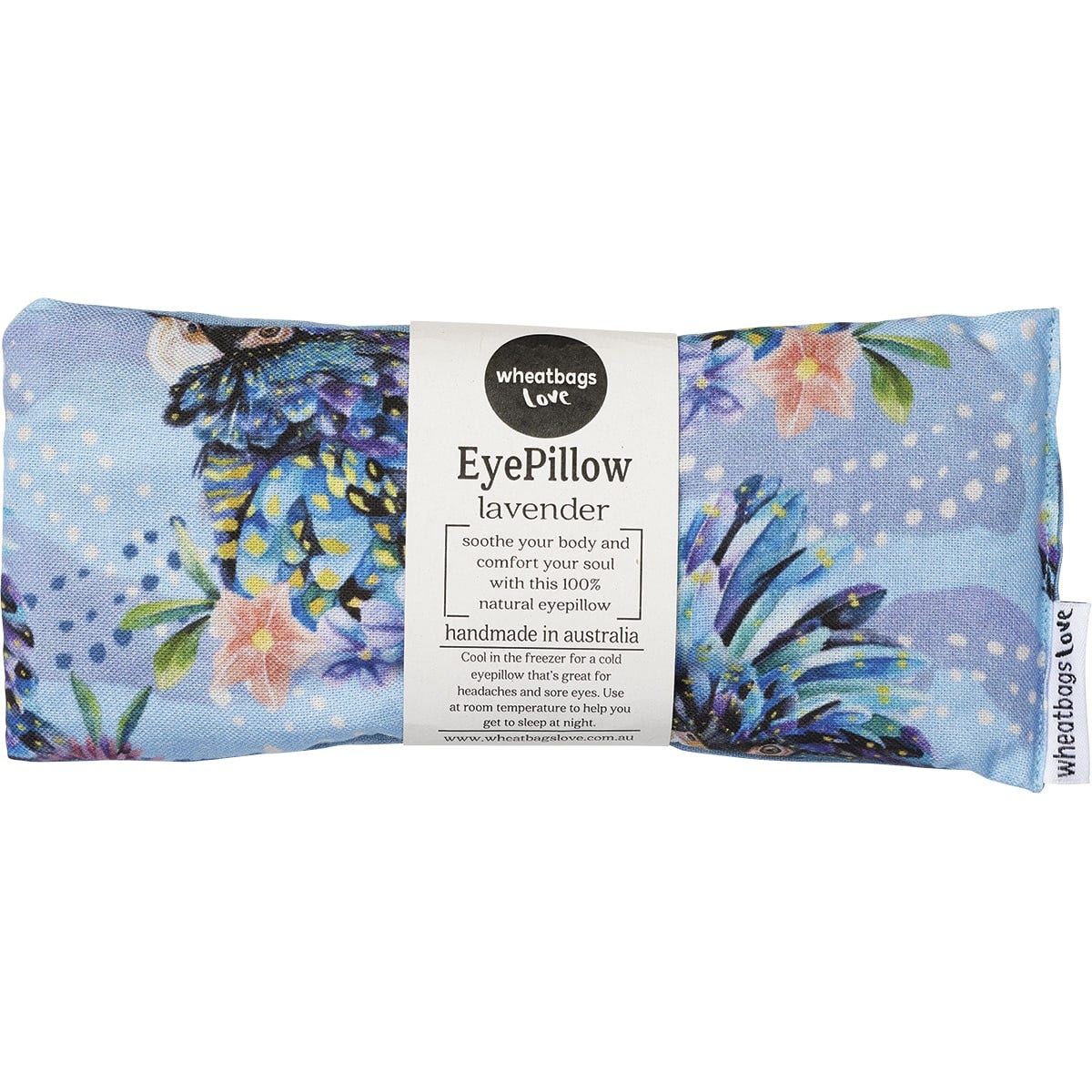 Lavender-scented eye pillow with a blue cockatoo and botanical print on a white background.