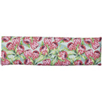 Wheatbags Love lavender-scented wheatbag with a pink protea print, shown folded in half on a white background.