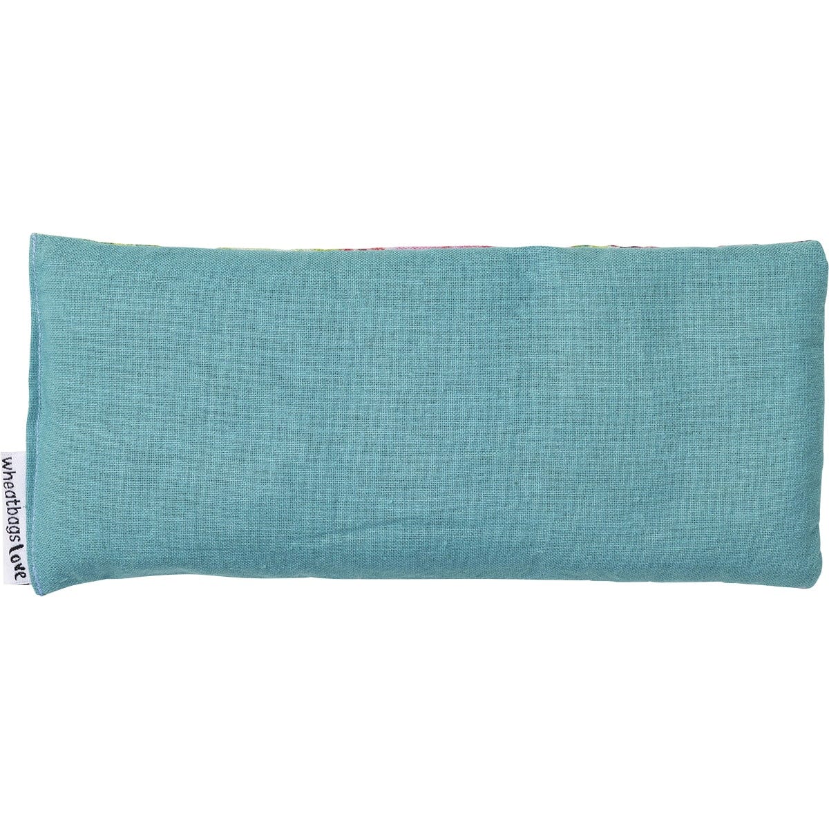 Soft pink cotton back of a Wheatbags Love Protea eyepillow on a white background.