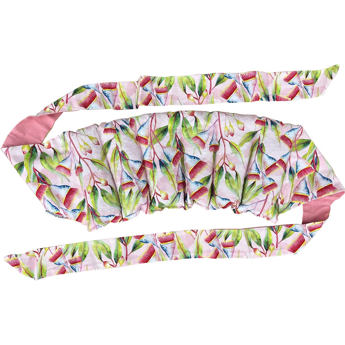 Wheatbags Love wrap-around pack in Gum Blossom floral print with a beige adjustable cotton strap.