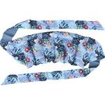 Blue Cockatoo print wrap-around heat pack with long cotton straps for hands-free placement on a white background.