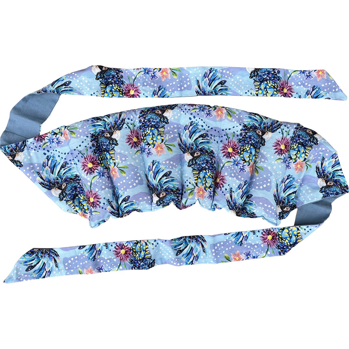 Blue Cockatoo print wrap-around heat pack with long cotton straps for hands-free placement on a white background.