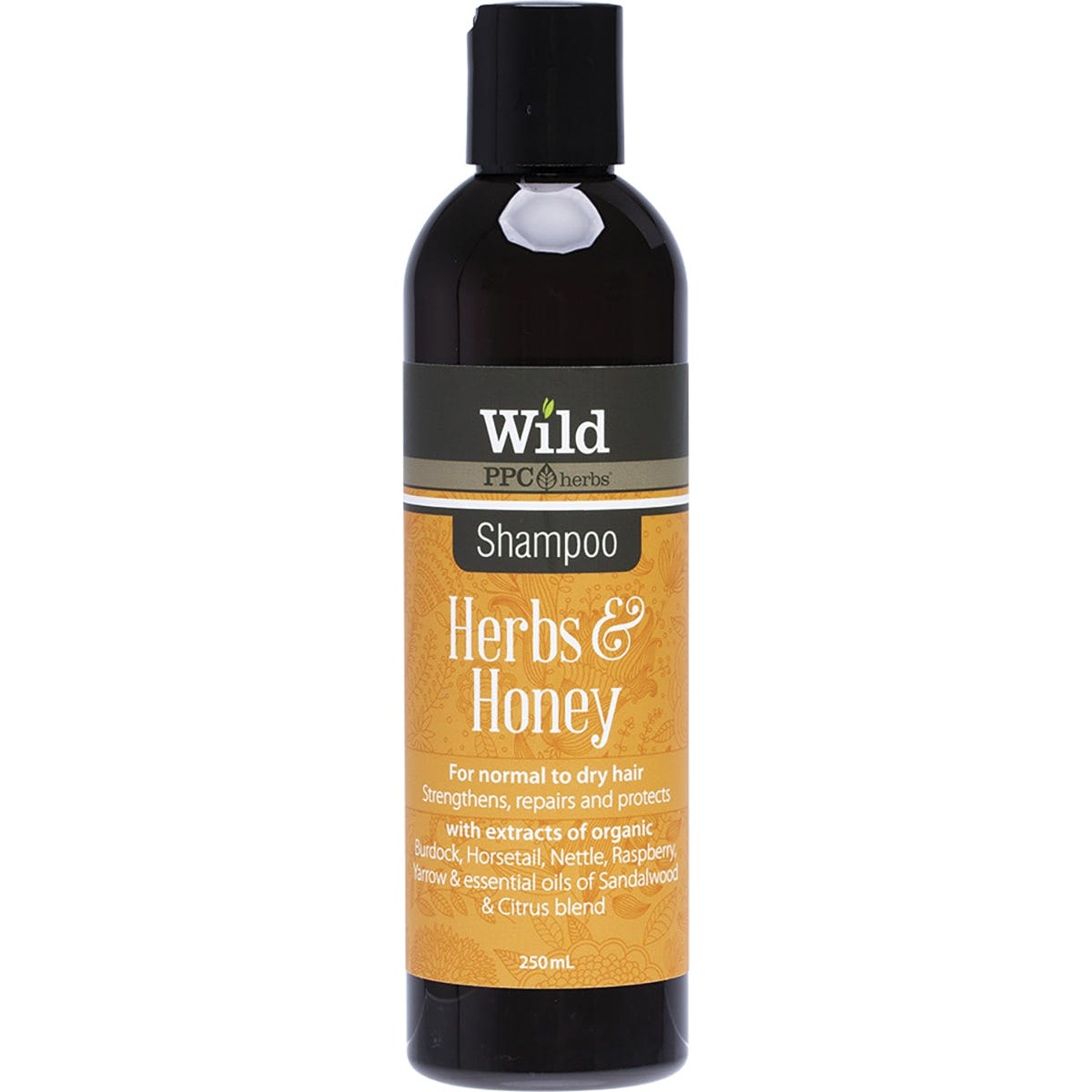 250ml bottle of Wild Herbs and Honey Shampoo for normal to dry hair with a green and white botanical label.
