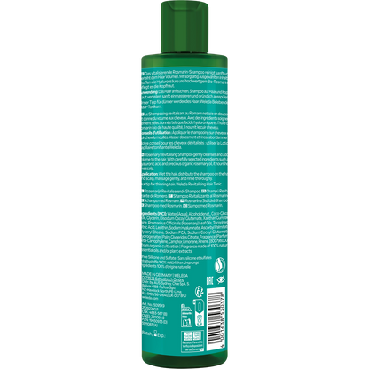 Back of white Weleda Revitalizing Shampoo bottle showing ingredients, organic certification, and product details.