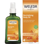 Weleda Sea Buckthorn Revitalising Body Oil 100ml bottle and packaging box with botanical illustrations.