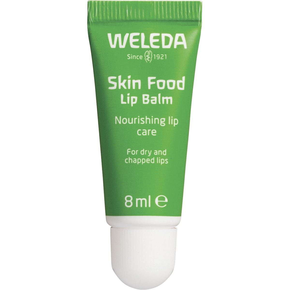 8ml green tube of Weleda Skin Food Lip Balm for dry and chapped lips on a white background.