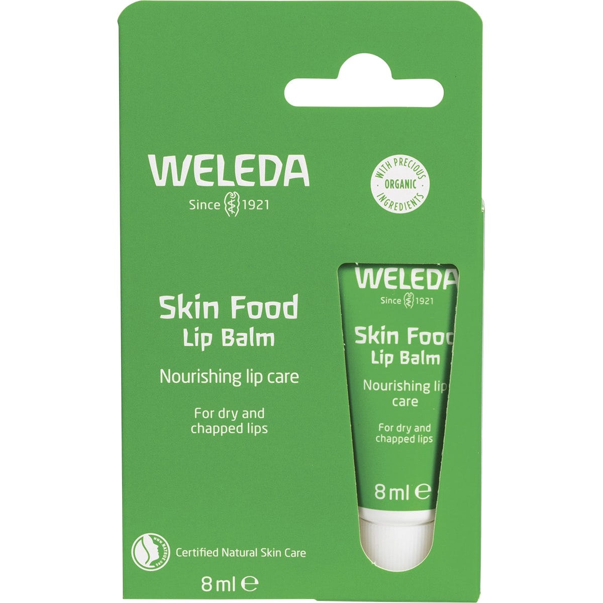 Green retail box for Weleda Skin Food Lip Balm 8ml featuring a botanical design on a white background.