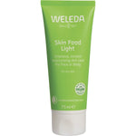 Weleda Skin Food Light 75ml green tube with botanical illustrations on a white background.