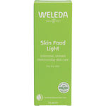 Green Weleda Skin Food Light 75ml box with botanical illustrations of pansy, chamomile, and calendula on white background.