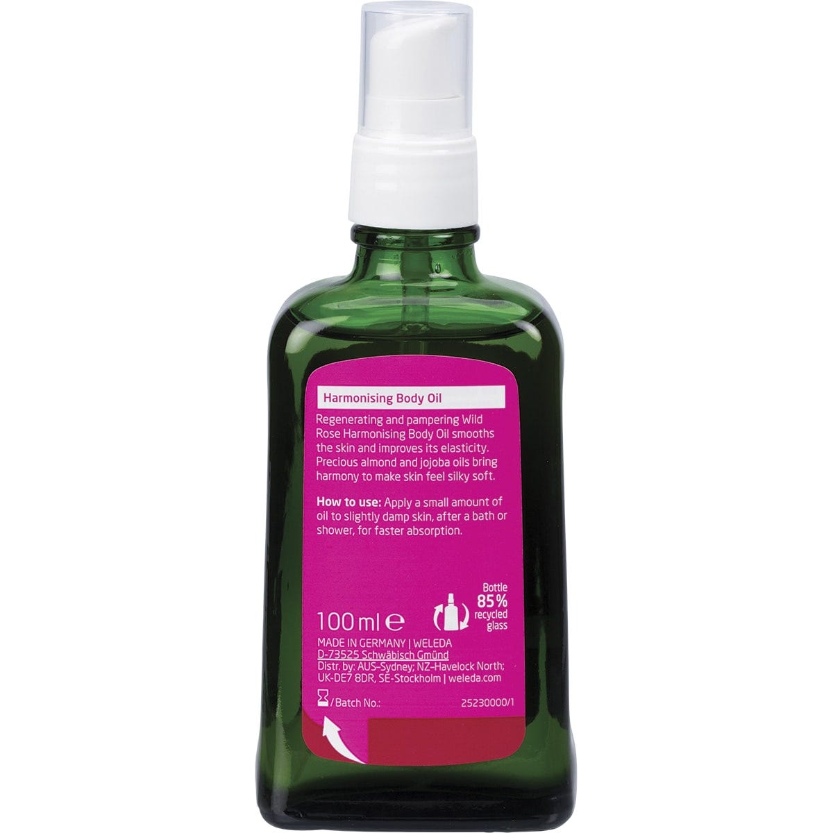 Back of a 100ml Weleda Wild Rose Harmonising Body Oil glass bottle showing ingredients and product information.