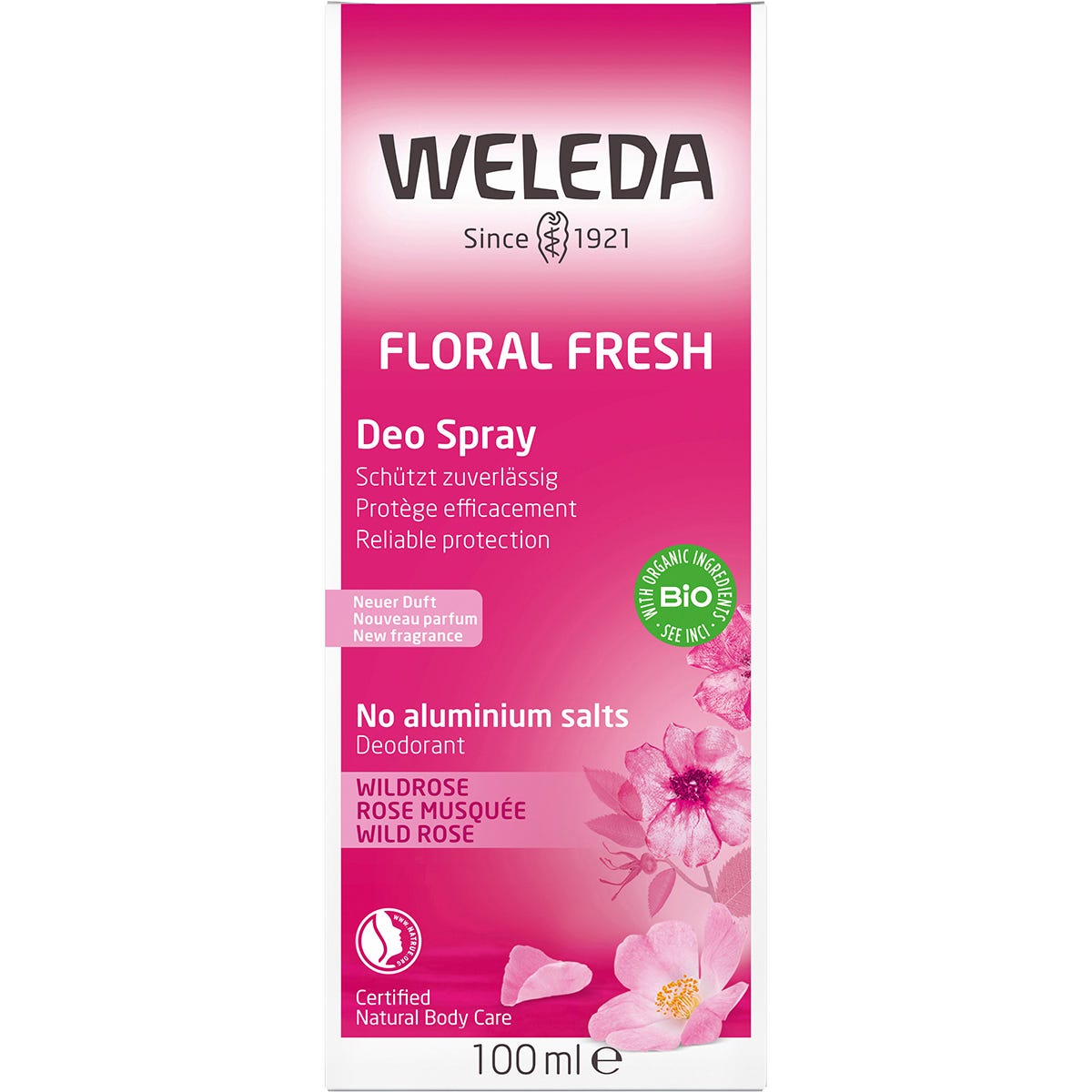 Pink retail box for Weleda Wild Rose Deodorant Spray 100ml with floral illustrations on a white background.