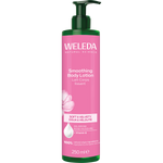 250ml bottle of Weleda Smoothing Body Lotion Wild Rose with a pink label featuring a rose illustration.