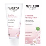 Weleda Sensitive Cleansing Lotion Almond 75ml tube standing next to its matching pink and white product box.