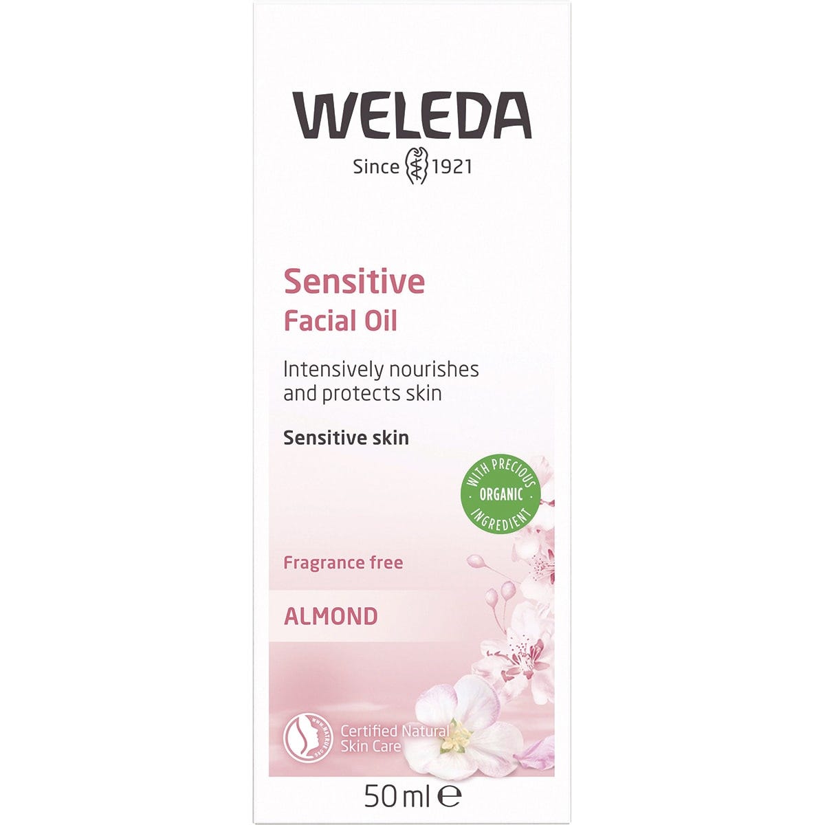 Weleda Sensitive Facial Oil Almond 50ml retail box with pink and white almond blossom illustrations.