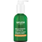 150ml bottle of Weleda Makeup Removal Cleansing Oil with a pump dispenser and apricot illustrations.