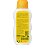Back of orange Weleda baby bath bottle showing detailed product information, ingredients list, and barcode.
