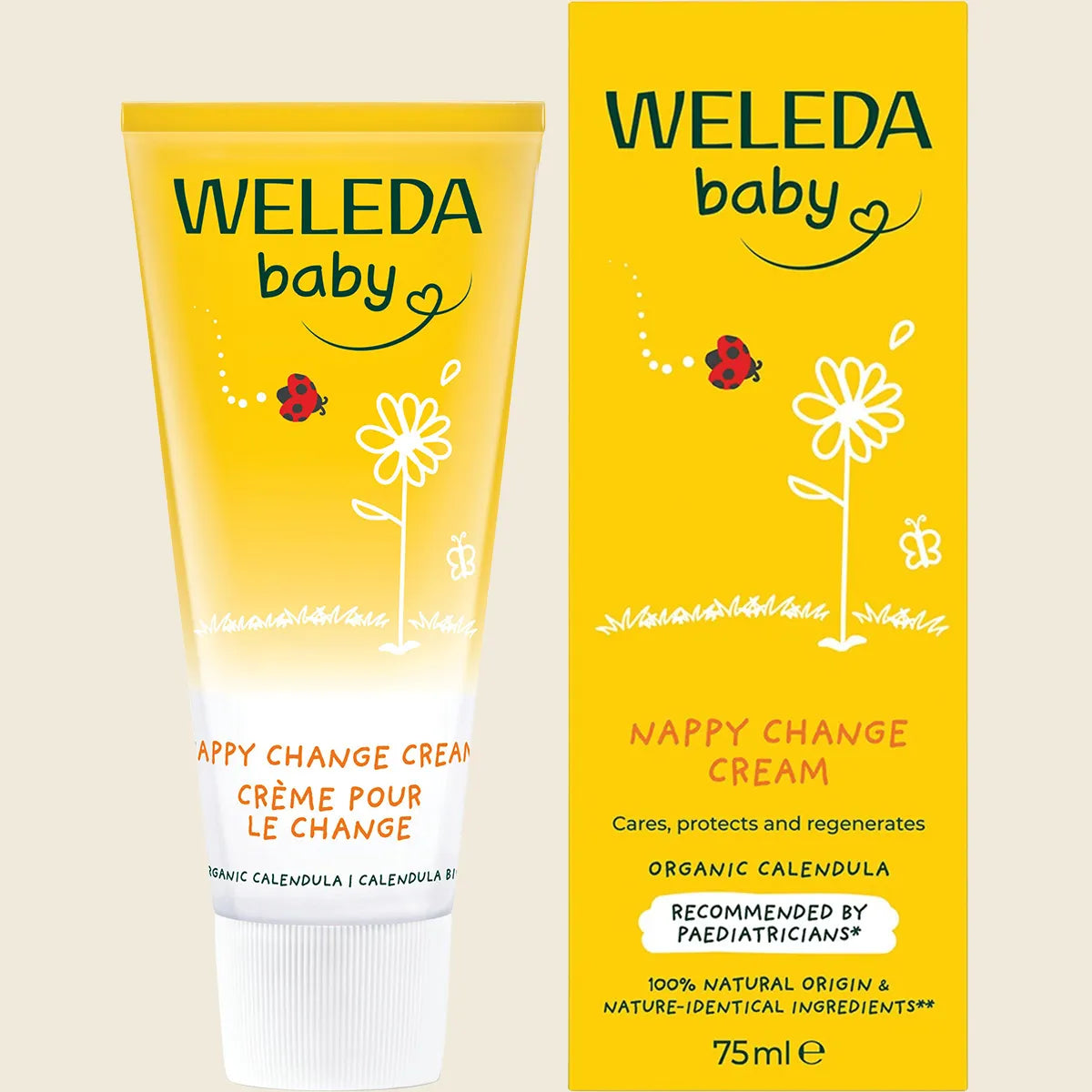 Weleda baby nappy change cream tube and packaging on a beige background