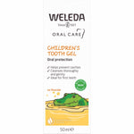 Front of a Weleda Children's Tooth Gel box with orange and white details and an illustration of a child brushing.