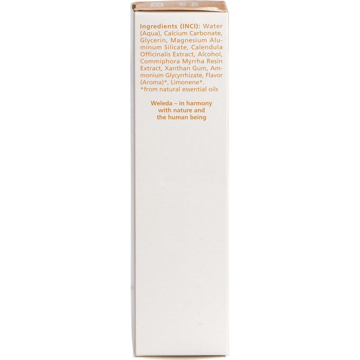 Left side of Weleda Calendula Toothpaste box showing features, advantages, and usage directions in orange and black text.