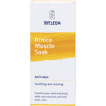 White Weleda Arnica Muscle Soak 200ml box featuring yellow arnica flower illustrations on a white background.